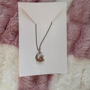 Elegant Silver and Gold Crescent Necklace